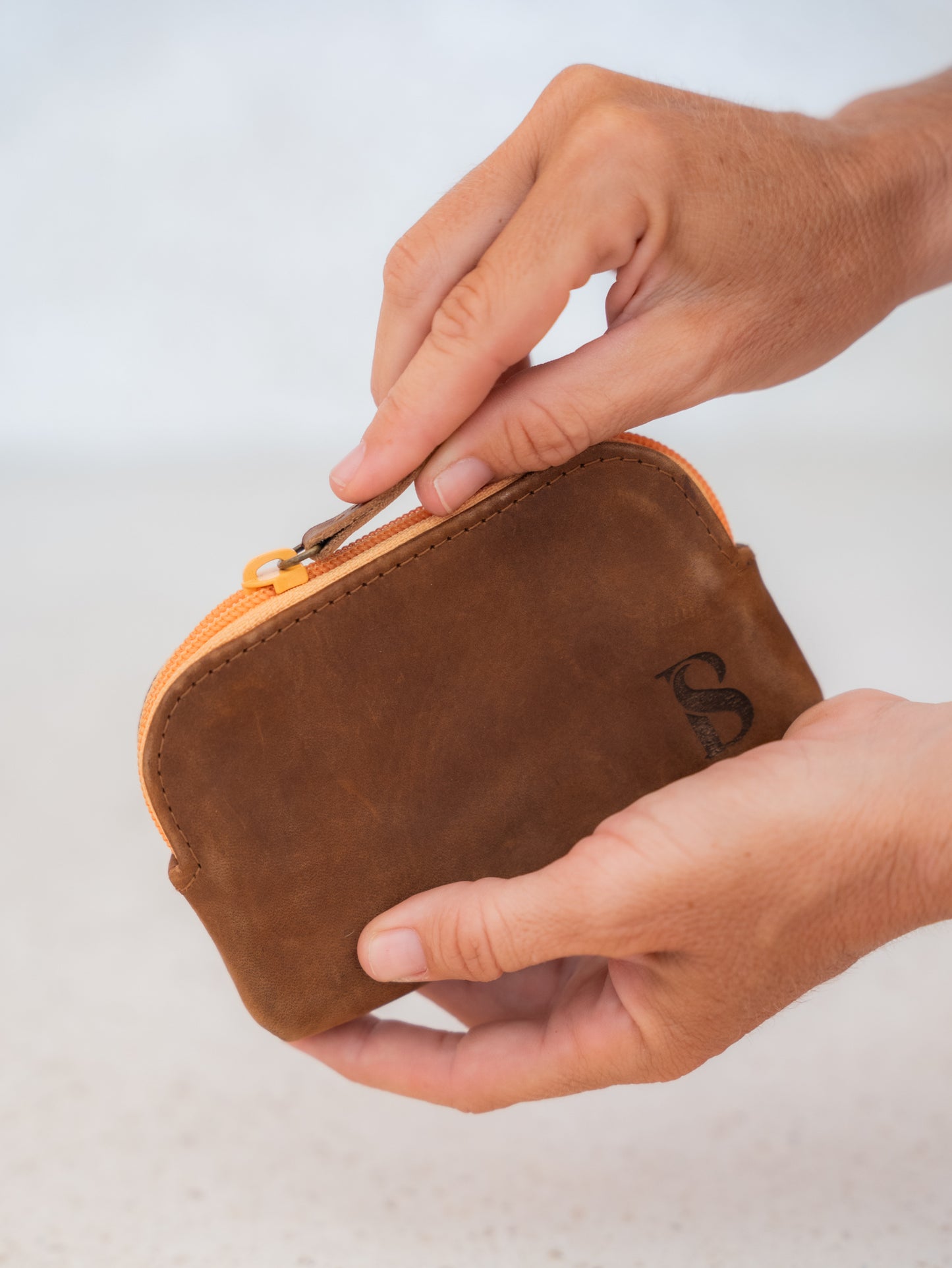 Pop zipper wallets